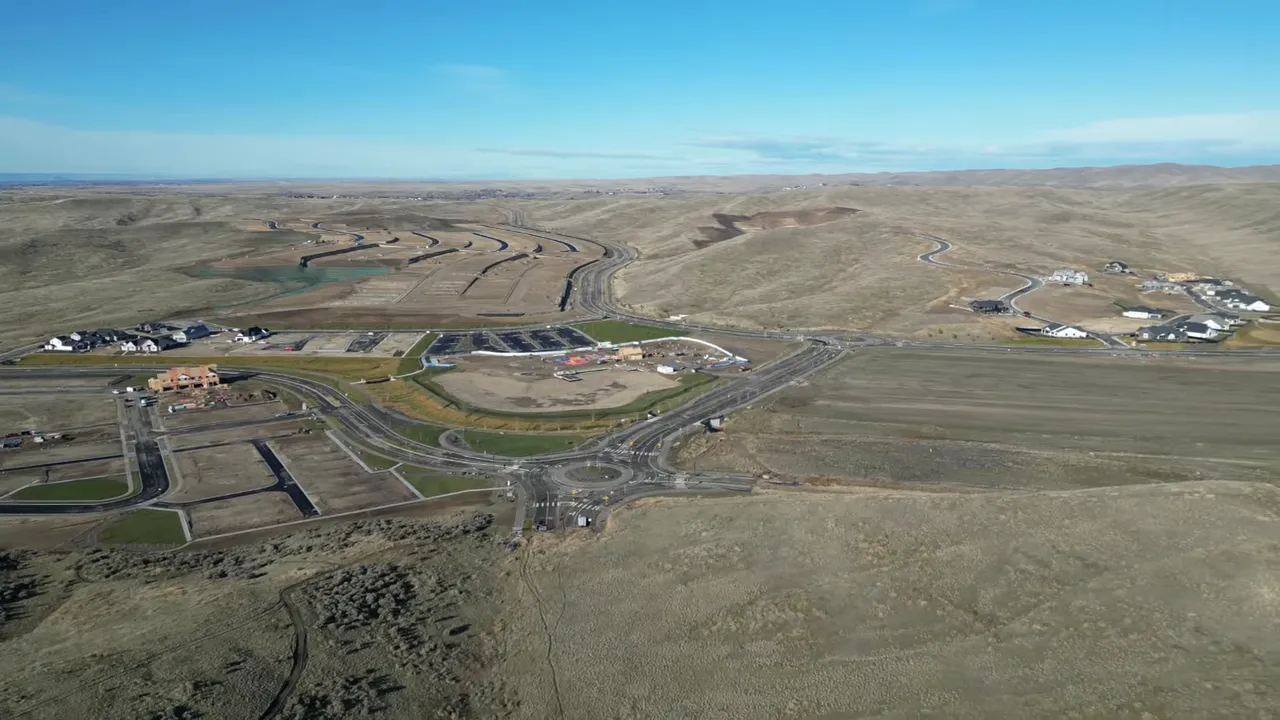 Aerial view of Valnova construction site and surrounding terrain in Eagle foothills