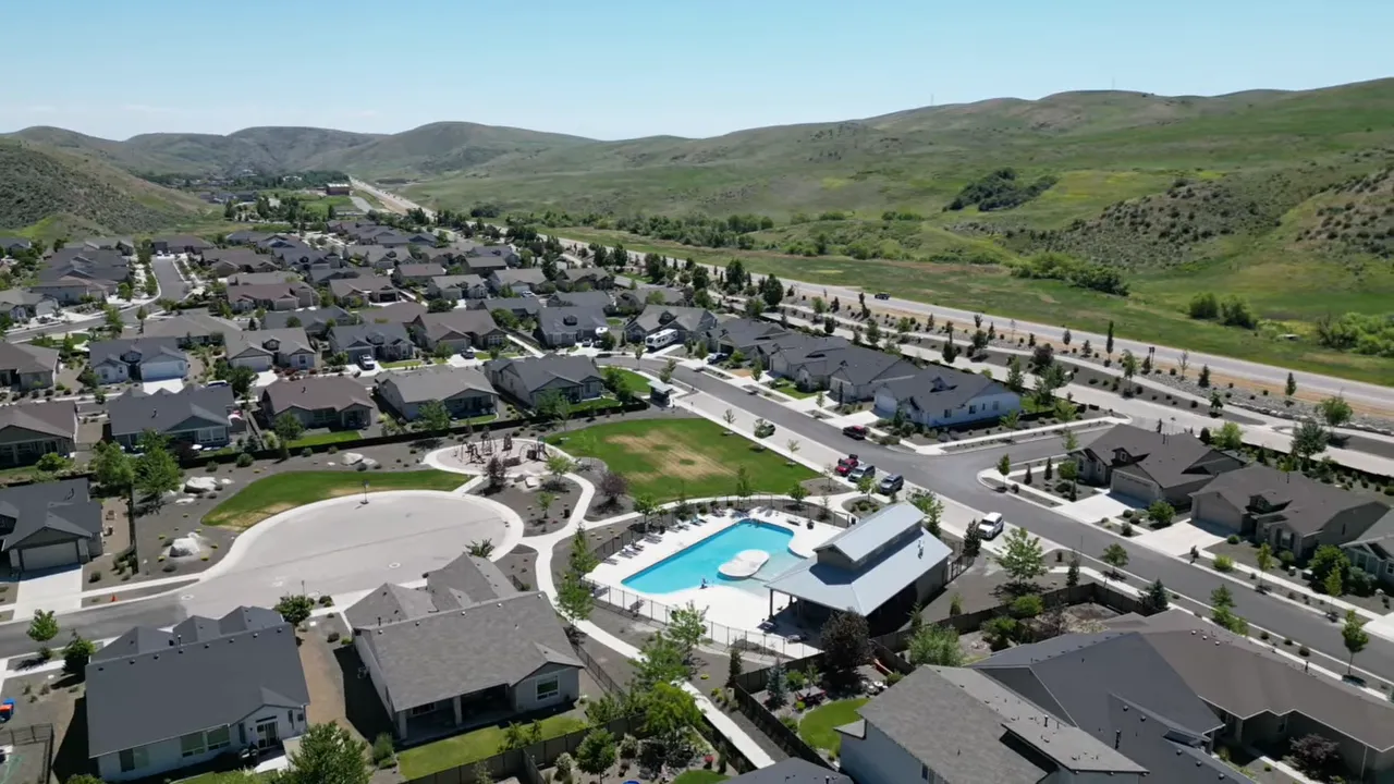 Aerial view of Avimor community layout with neighborhood streets, pool, and surrounding hills near Eagle, Idaho