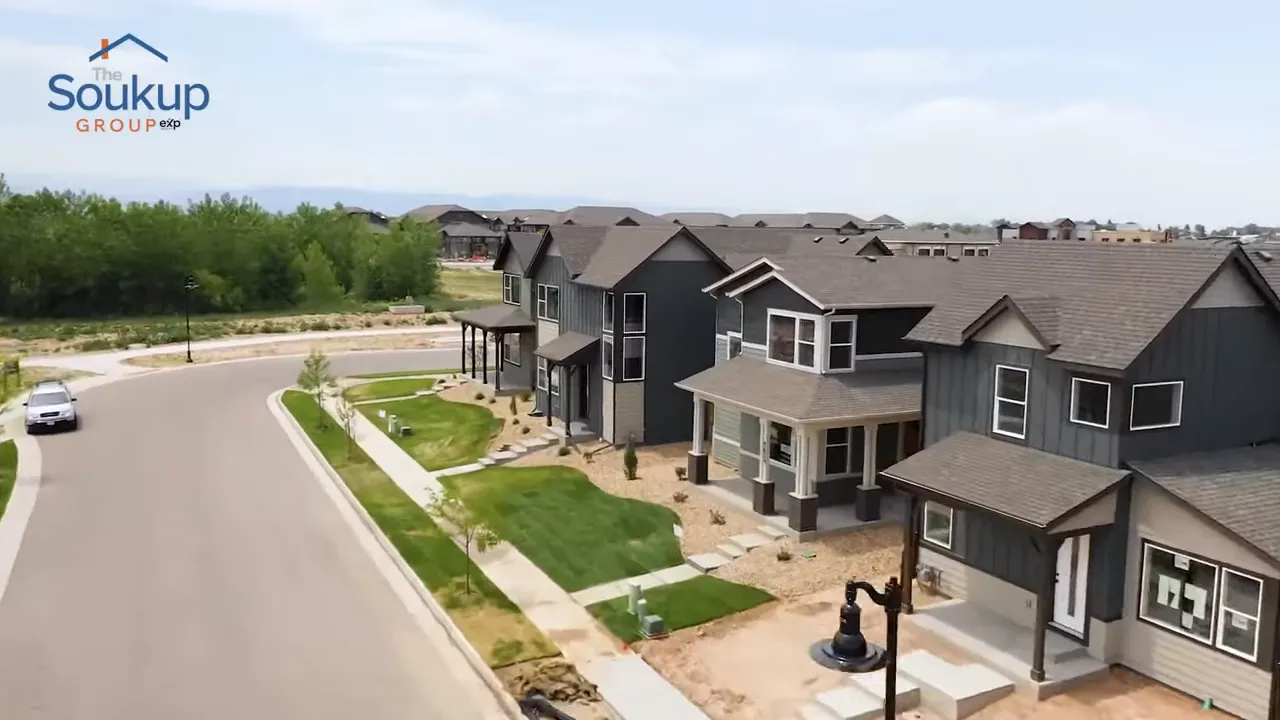 Newly built homes lining a wide suburban street