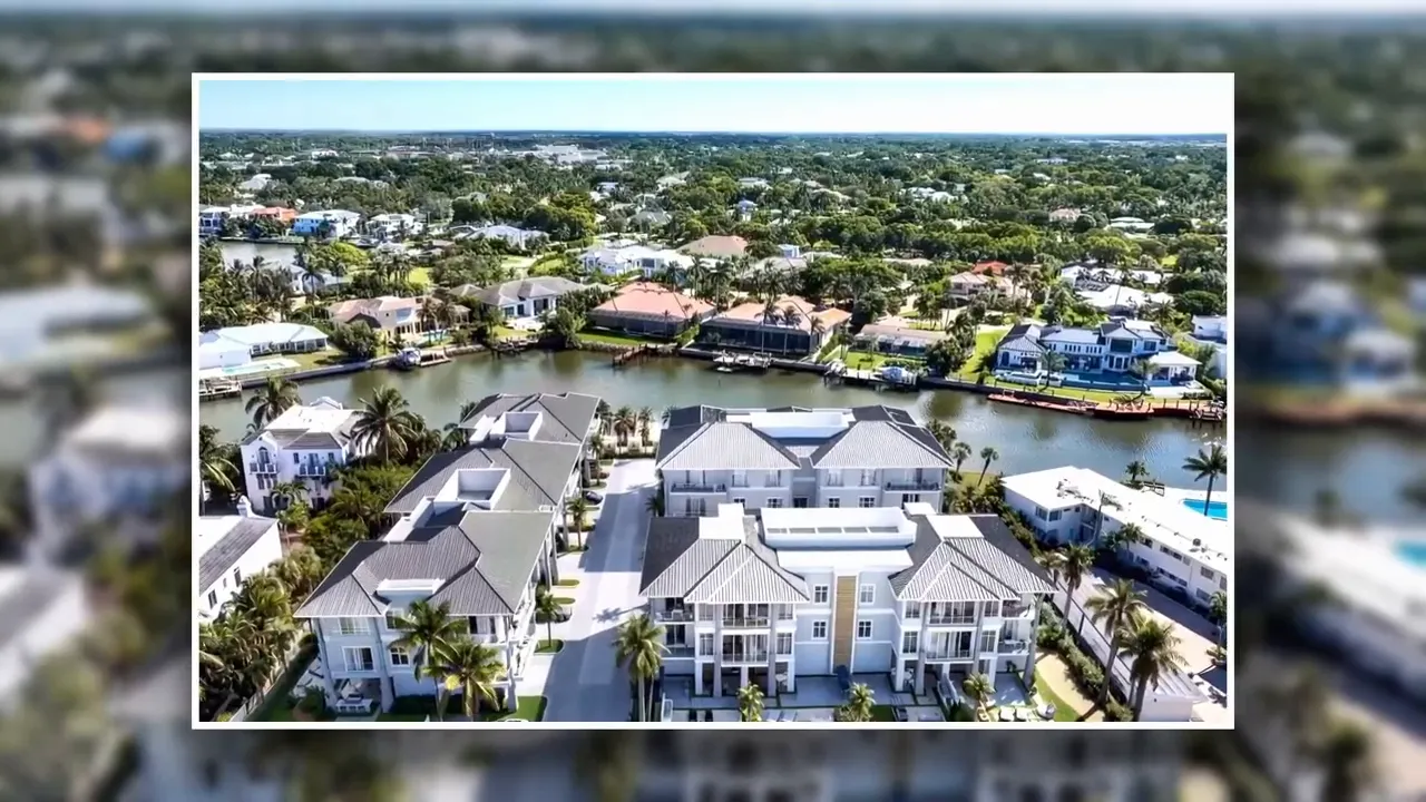 Aerial rendering of Harbor House waterfront residences and boat docks