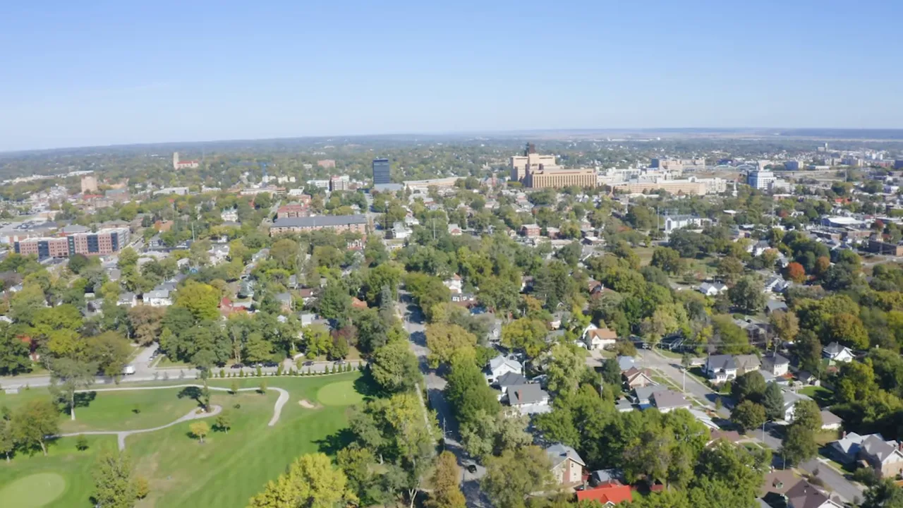 Aerial view of Omaha, Nebraska showing neighborhoods, trees, and parks