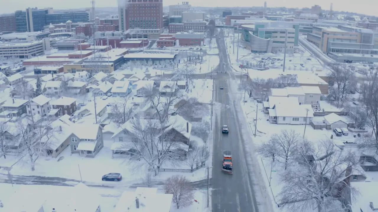 Aerial view of Omaha streets and neighborhoods covered in snow during winter