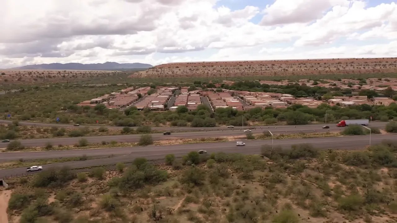 Aerial view of large construction buildings in desert landscape
