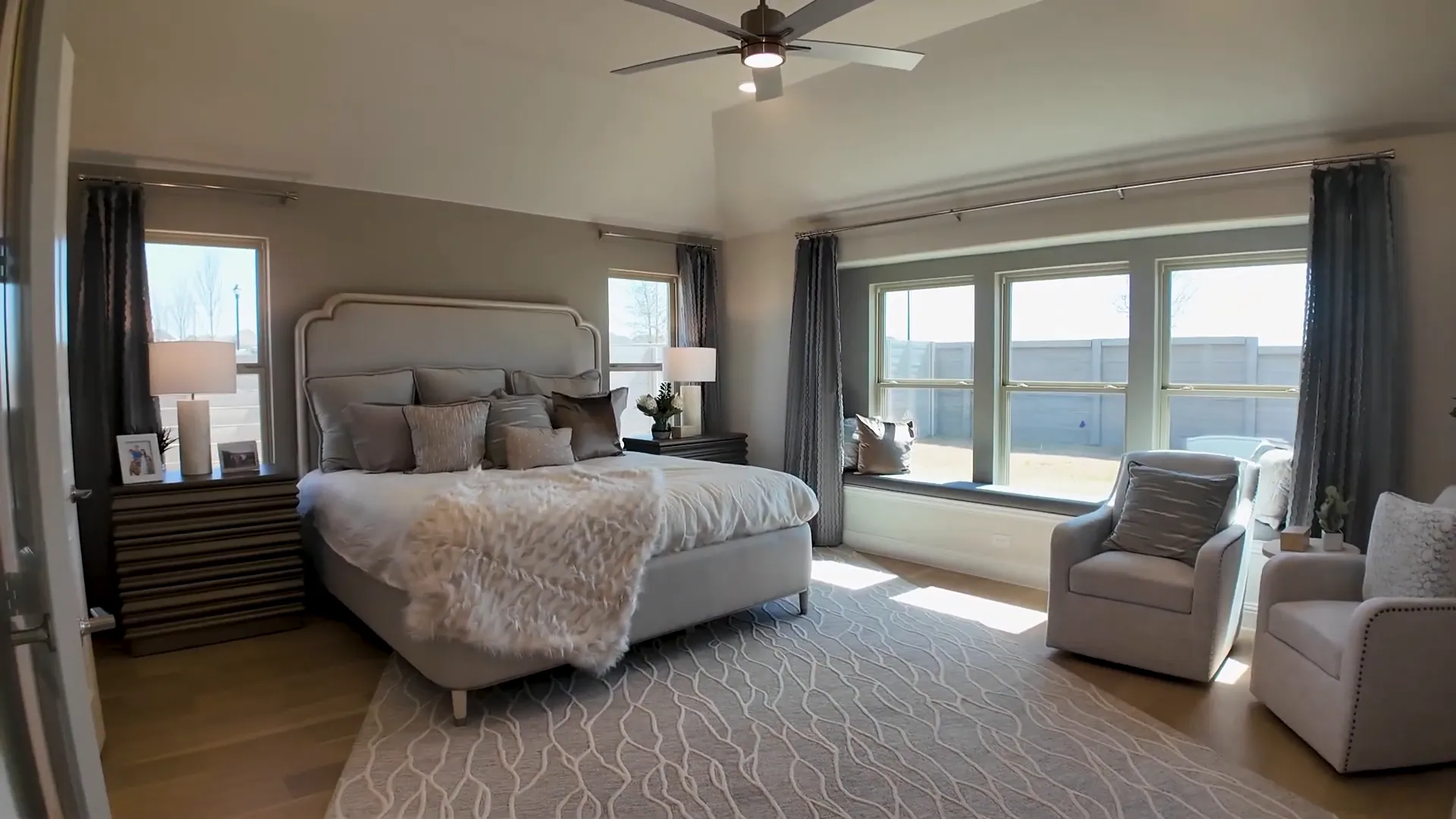 Luxurious primary suite with sitting area