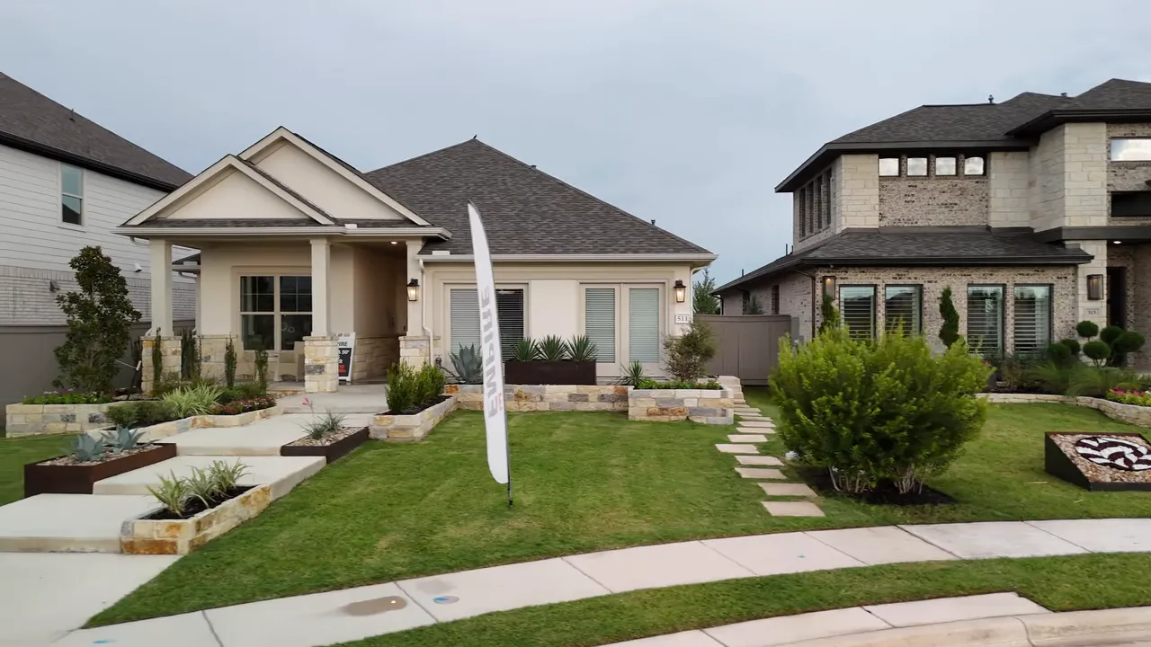 Model home sales rep talking with prospective buyers