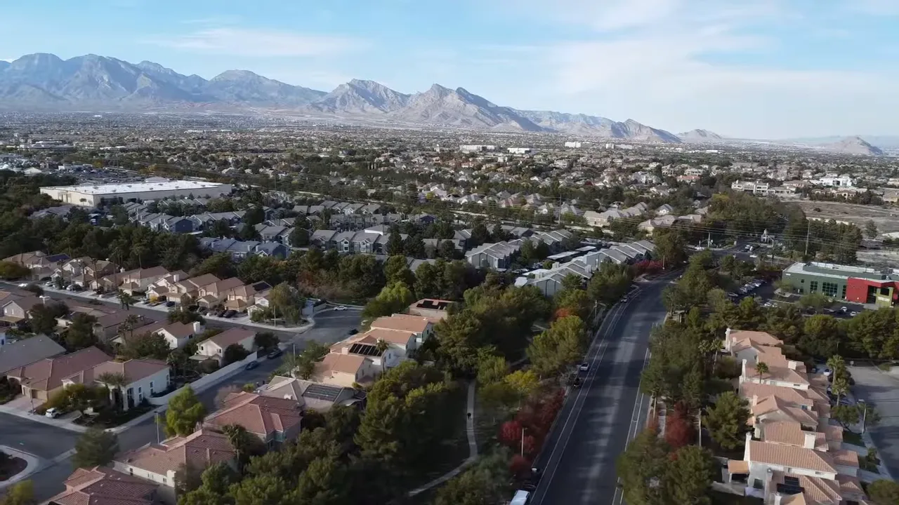 Aerial view of Summerlin neighborhoods with mountains in the distance