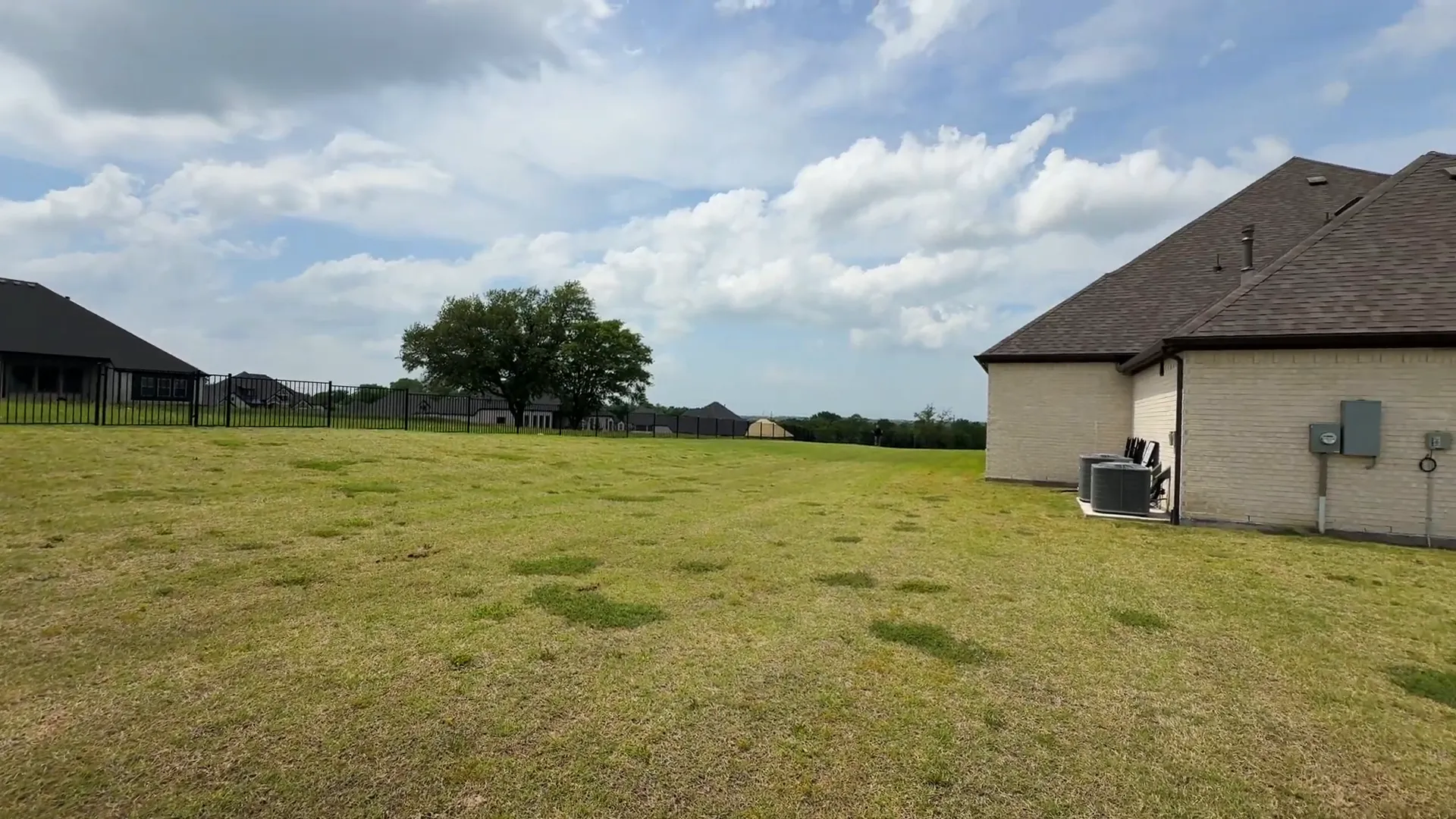 Spacious backyard showing the vast acreage of the property