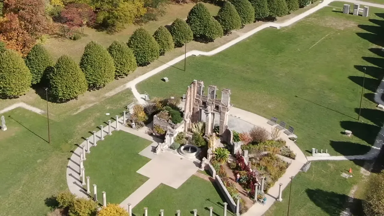 Close aerial photo of the stone ruins and semicircular amphitheater at Holiday Park