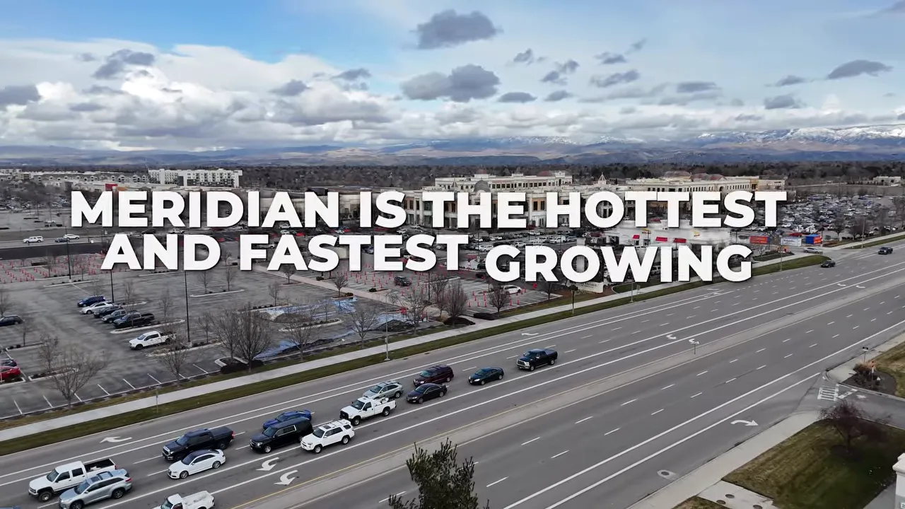 aerial view of a busy meridian shopping area with large text saying meridian is the hottest and fastest growing