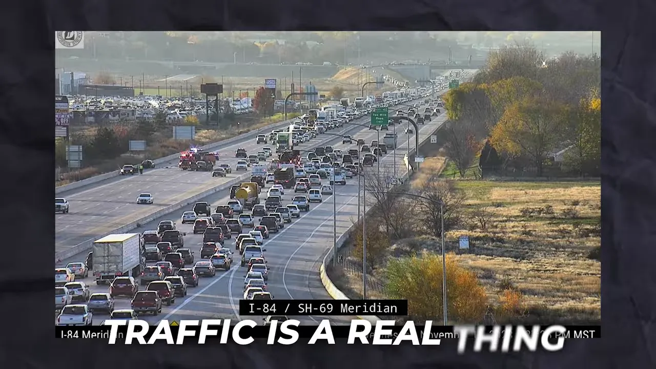 traffic camera view of heavy freeway traffic with text saying traffic is a real thing