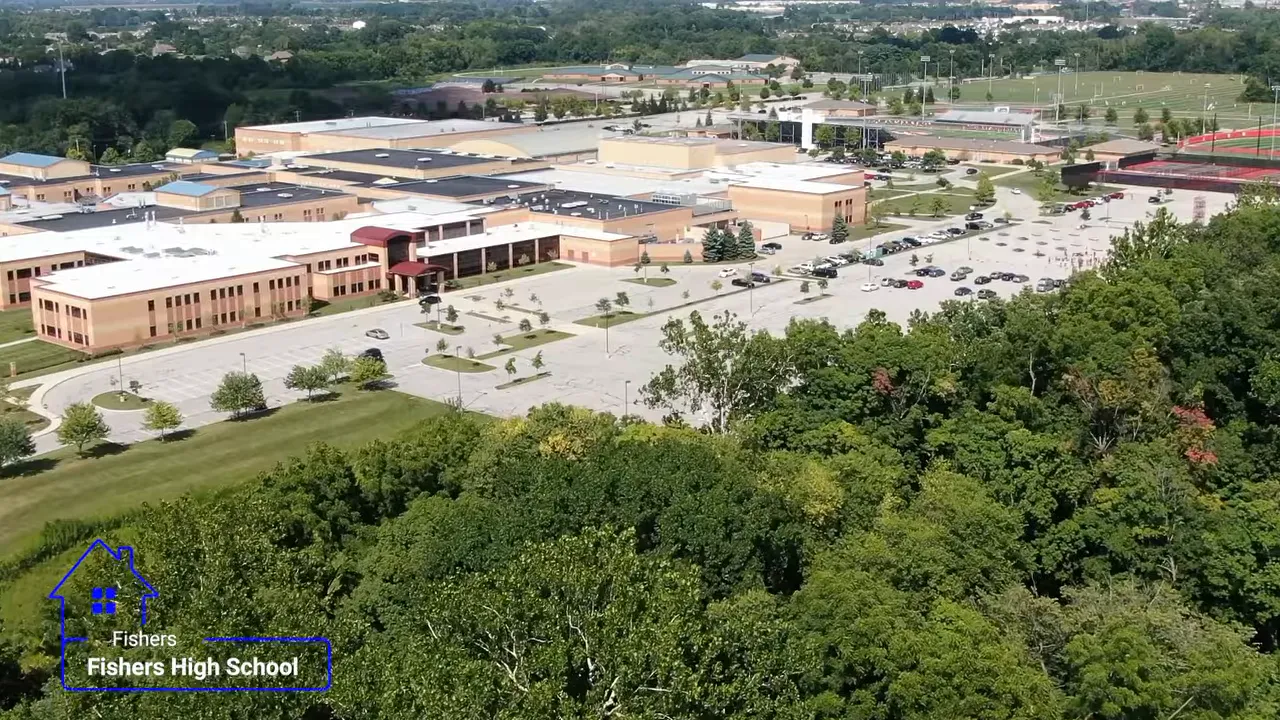 Aerial view of Fishers High School campus and parking lot