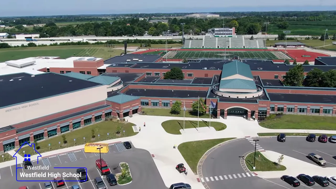 Aerial view of Westfield High School buildings and parking areas
