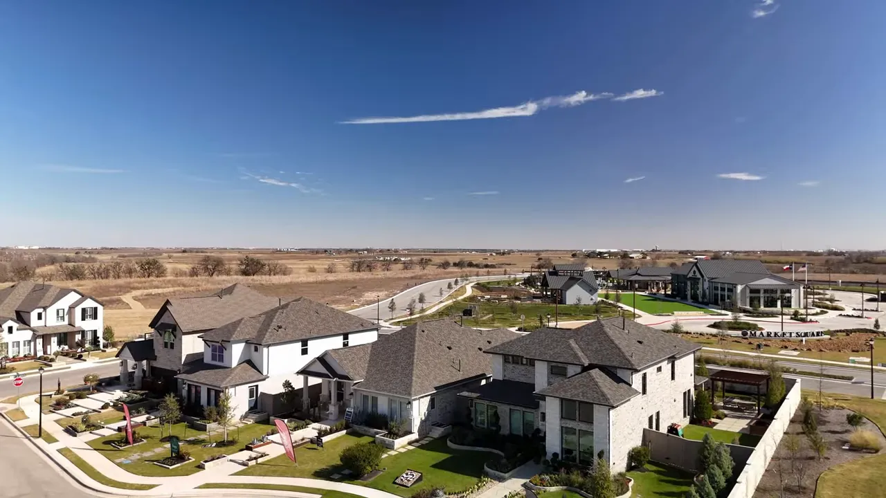 Aerial view of the Flora neighborhood showing homes, roads, trails and the Market Square amenity center