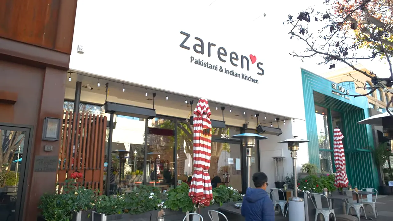 Zarin Pakistani and Indian Kitchen storefront sign and outdoor dining area in Redwood City