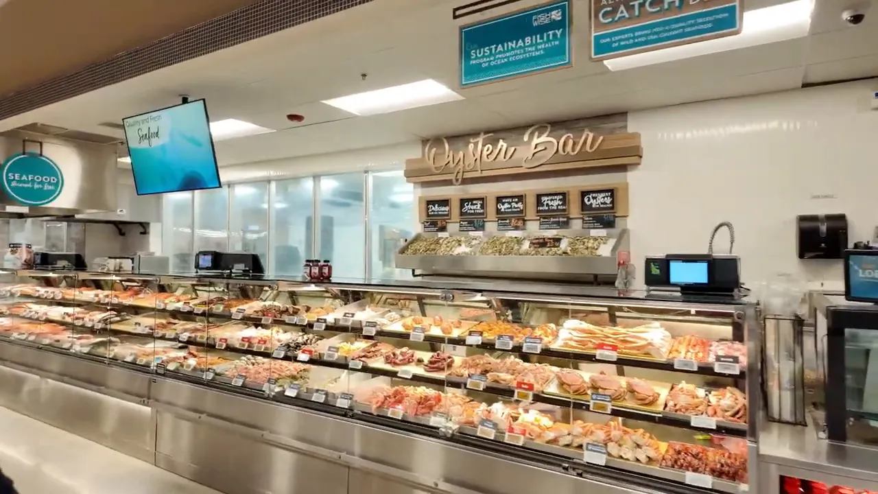 Inside view of a Meridian, Idaho grocery store with prepared foods and deli counters