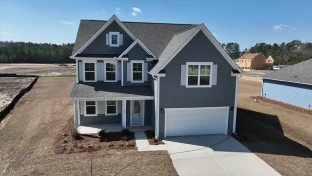 Aerial view of two-story Forester home on a wide cul-de-sac lot