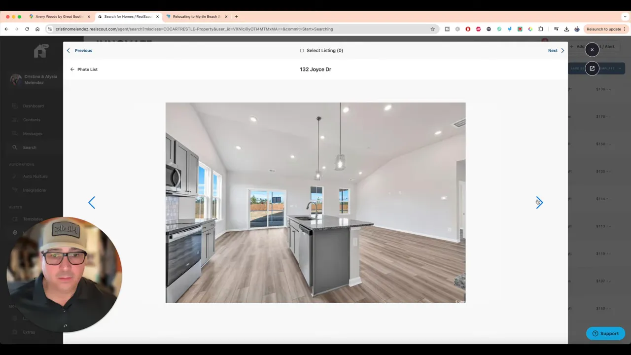 Open kitchen and living room view with pendant lighting in Longs SC new construction