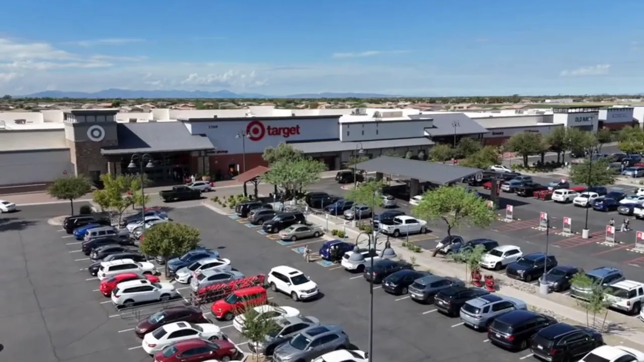 Aerial view of Target and a busy shopping center parking lot in Queen Creek
