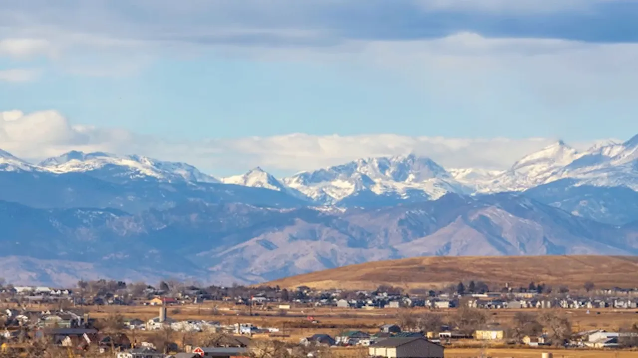 Wide mountain view above neighborhoods in Loveland