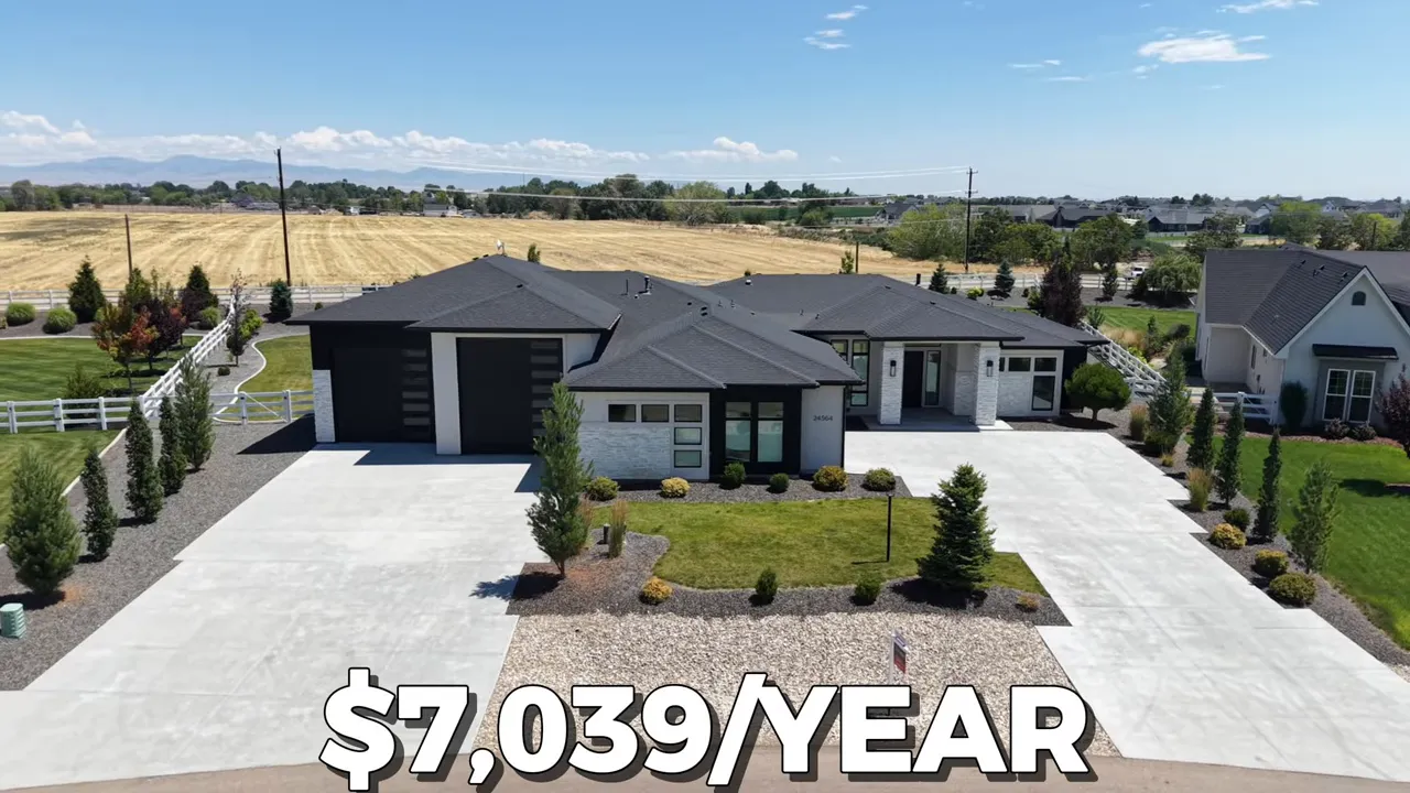 Aerial view of home with text showing annual property taxes of 7039 dollars