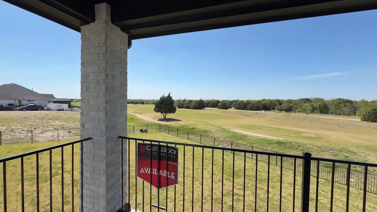 Open golf course view from balcony at Heath Golf & Yacht Club with available sign