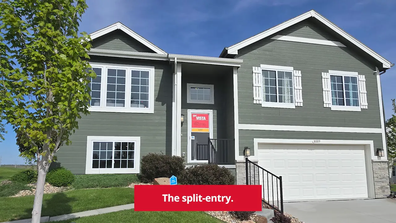 Front exterior of a split entry house with text on screen reading The split-entry