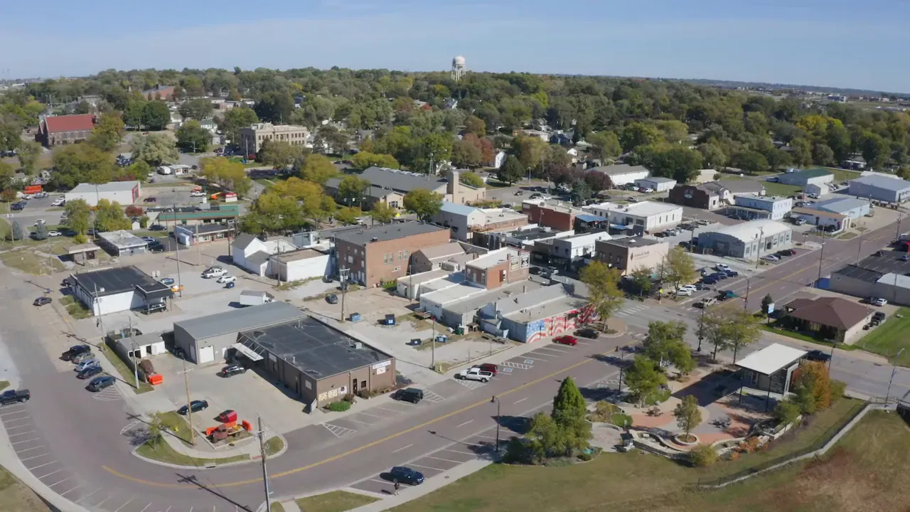 Aerial photograph of downtown Papillion, Nebraska with streets, buildings and surrounding trees