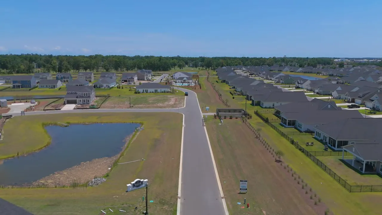 Aerial view of homes surrounding a community pool