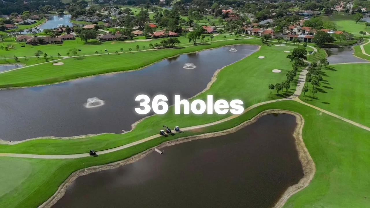 Aerial golf course and lake view with 36 holes text on screen