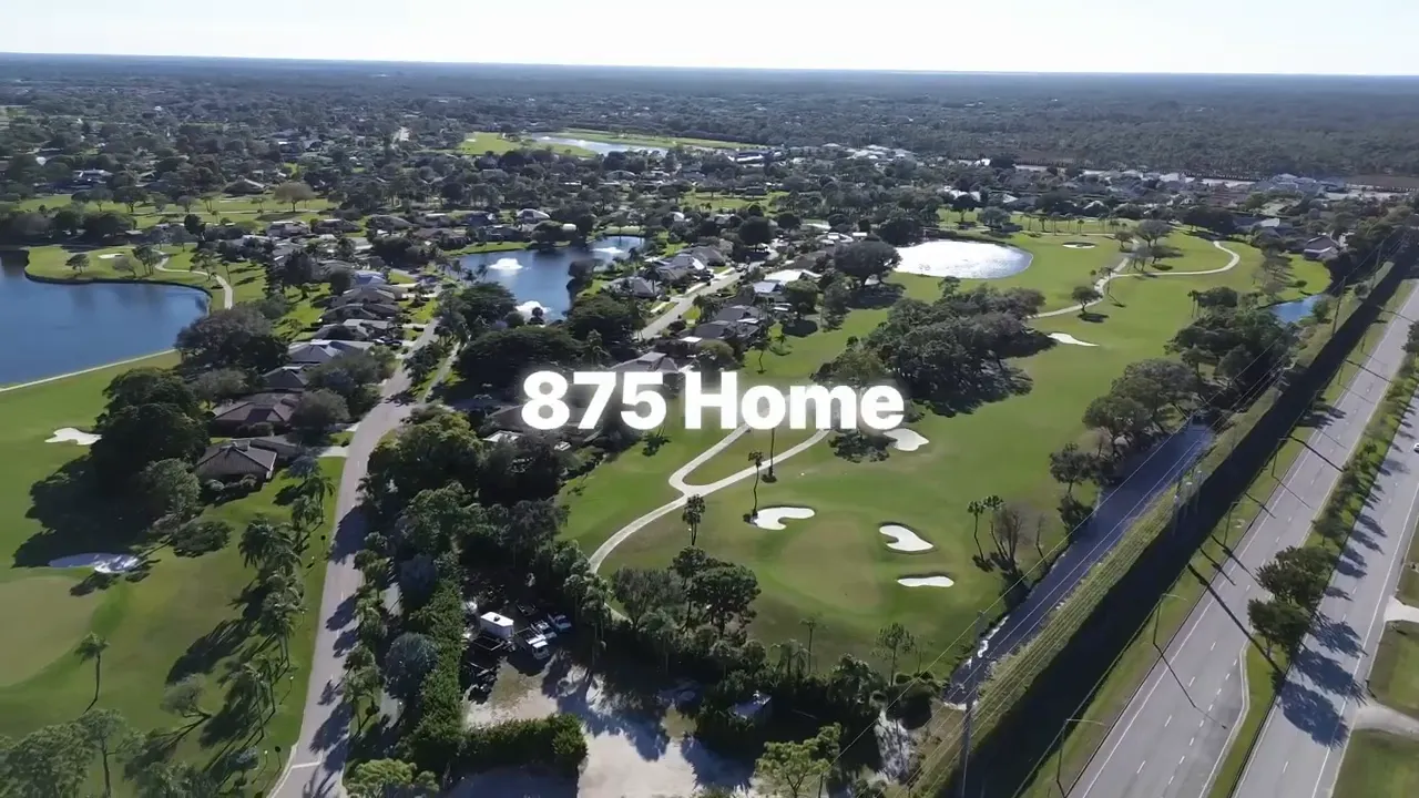 Aerial golf community view with 875 homes text over fairways and neighborhoods