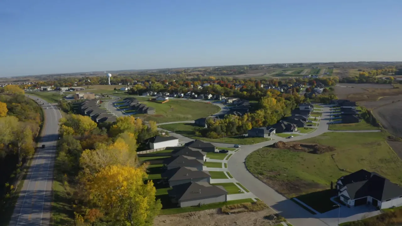 Aerial view of suburban neighborhood streets and homes
