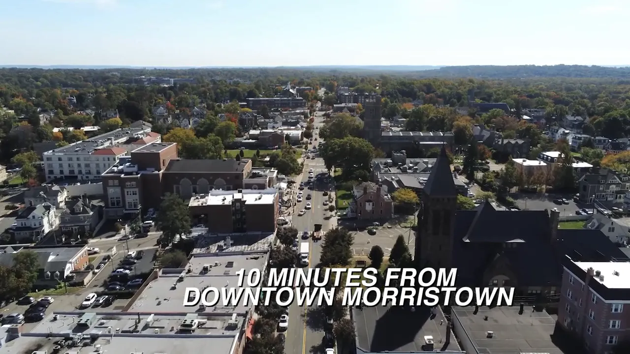 Aerial view of downtown Morristown with text saying 10 minutes from downtown Morristown