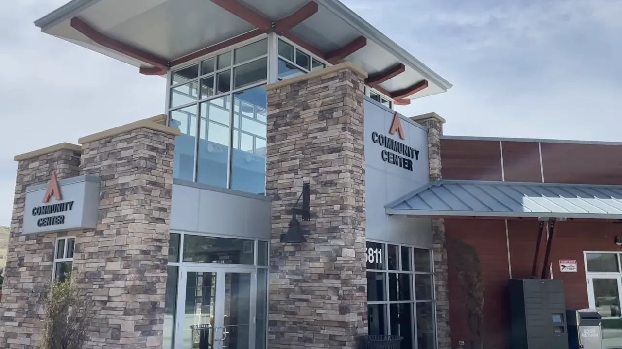 Avimor community center front entrance with stone columns and sign