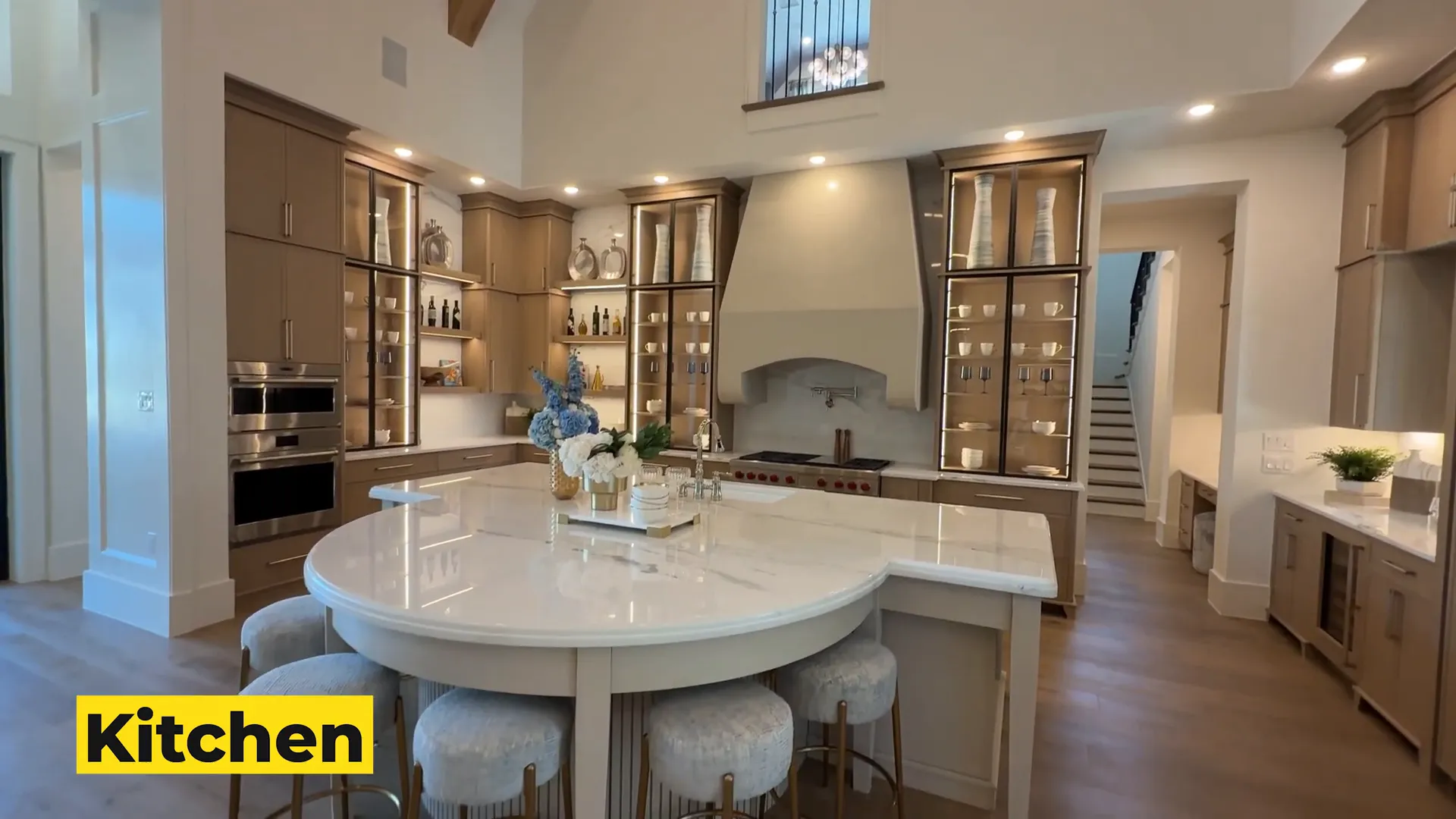 Marble kitchen with large island and high-end appliances