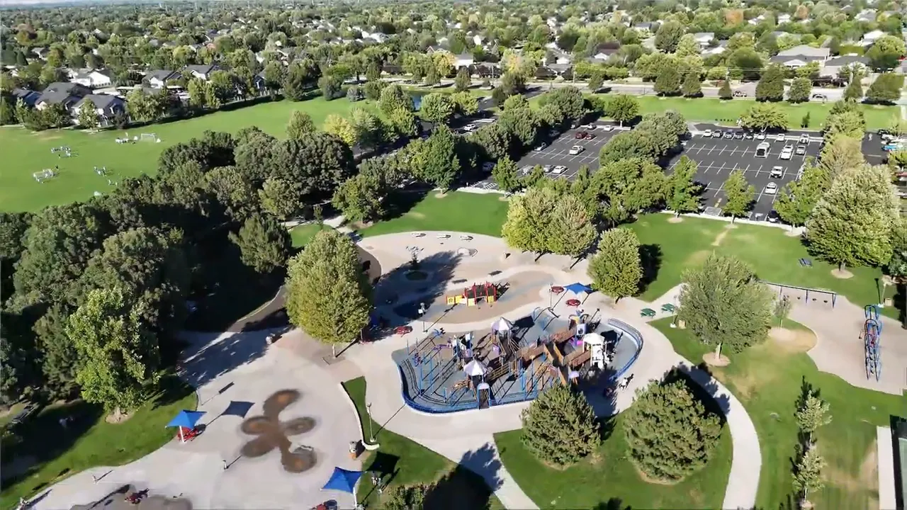 Aerial view of a Meridian park with playground and open green space
