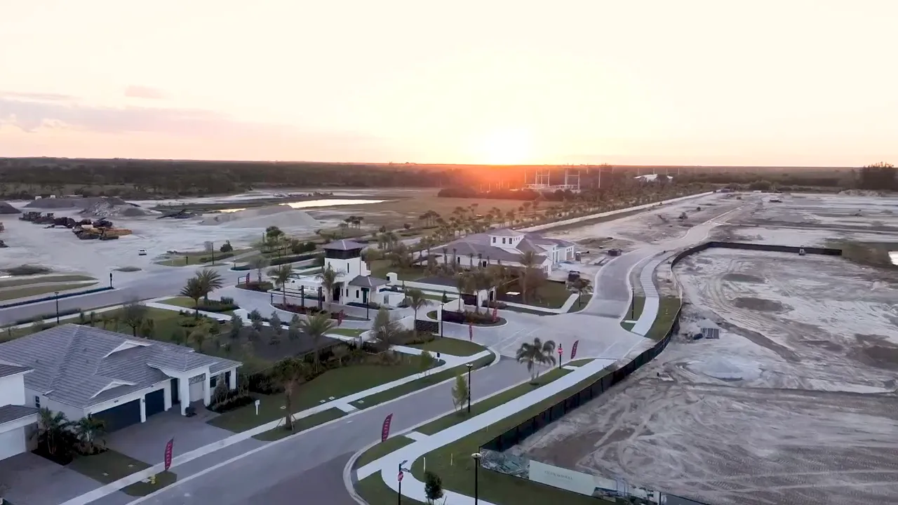 Aerial view of Westlake community roads and neighborhood homes at sunset