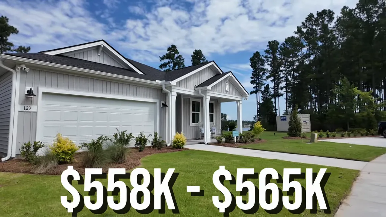 Stanwick model home exterior with large on‑screen price overlay reading $558K - $565K