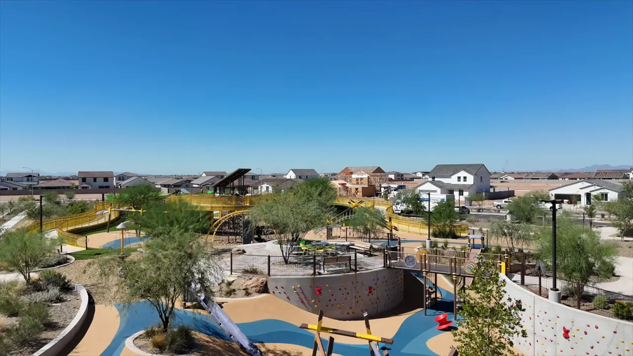 Adventure playground with climbing structures and walking paths