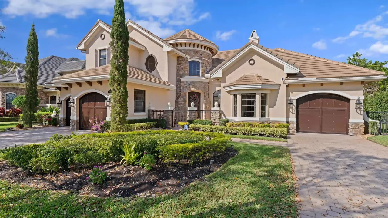 Gated community with clubhouse and pool in West Boynton