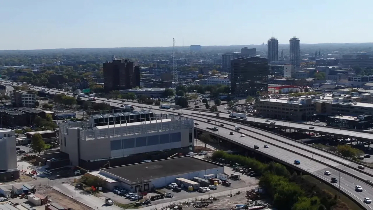 Construction crews and cranes working across the new medical campus