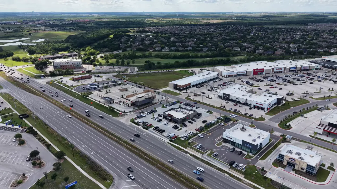 Aerial view of Manor Crossing retail center and large parking lots