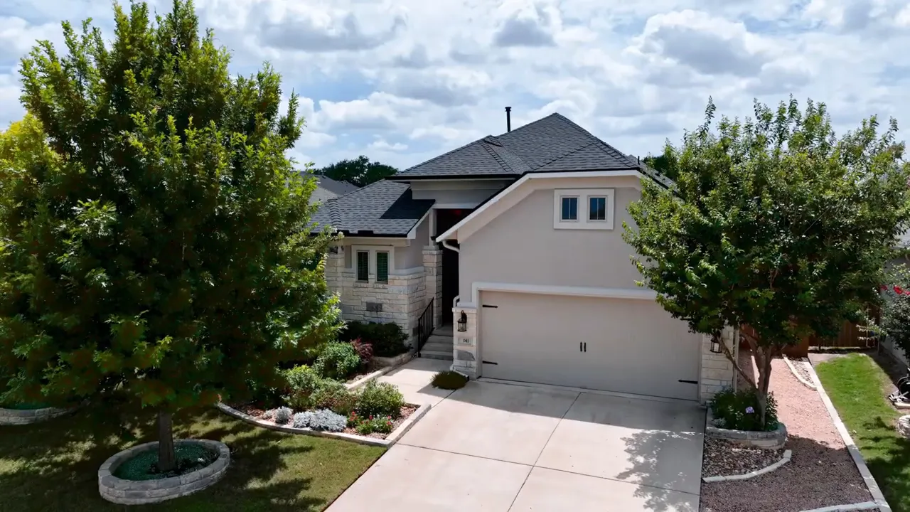 Front exterior view of the Georgetown home from the driveway
