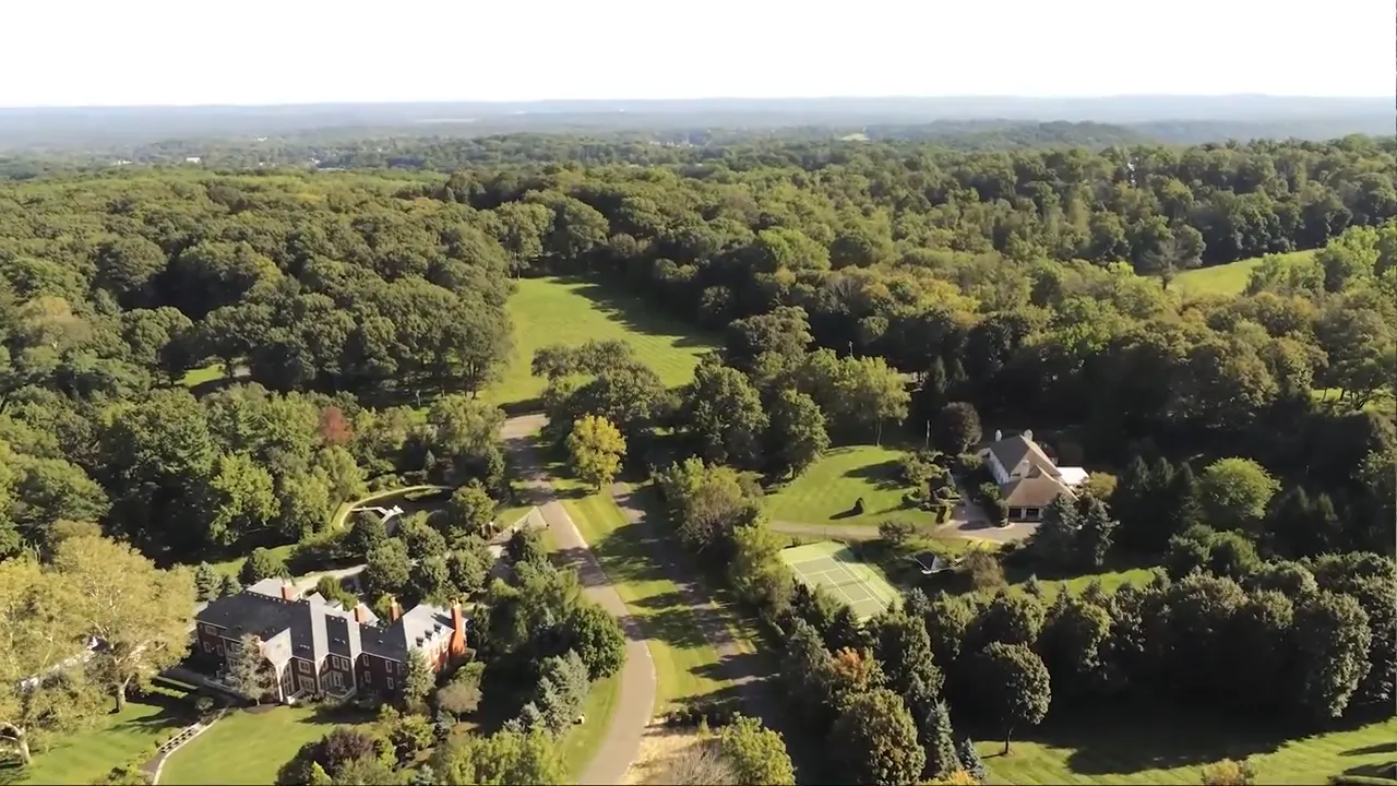 Aerial view of estate homes and forested landscape near Bernardsville, New Jersey
