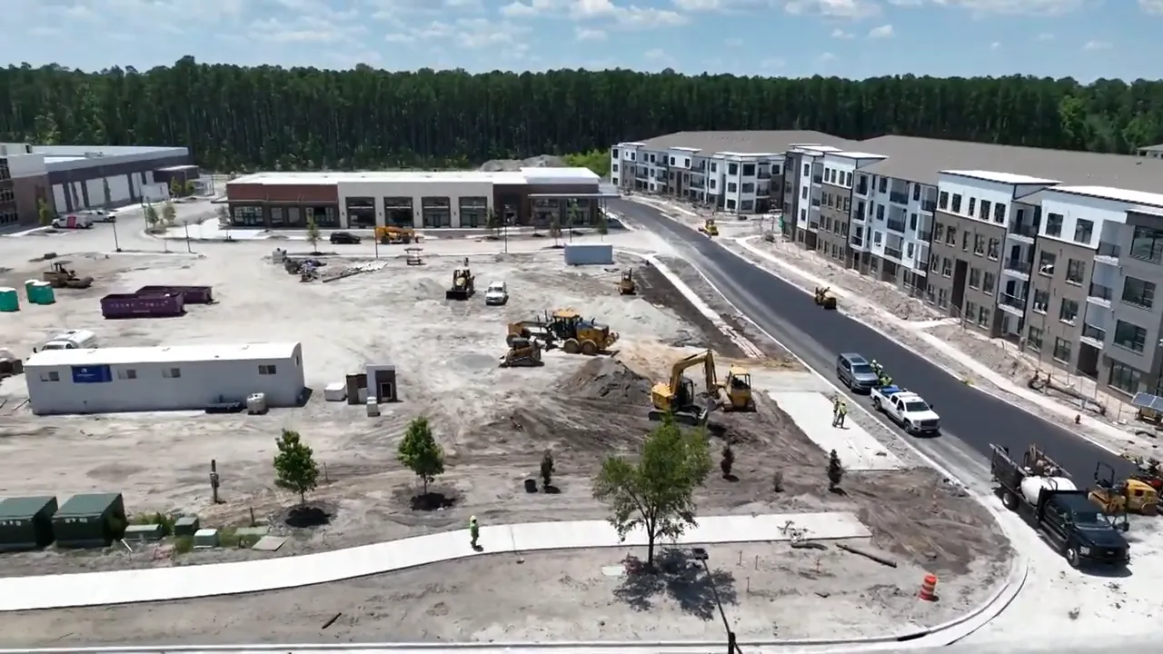 Aerial view of an active construction site and new buildings in a developing Summerville SC area