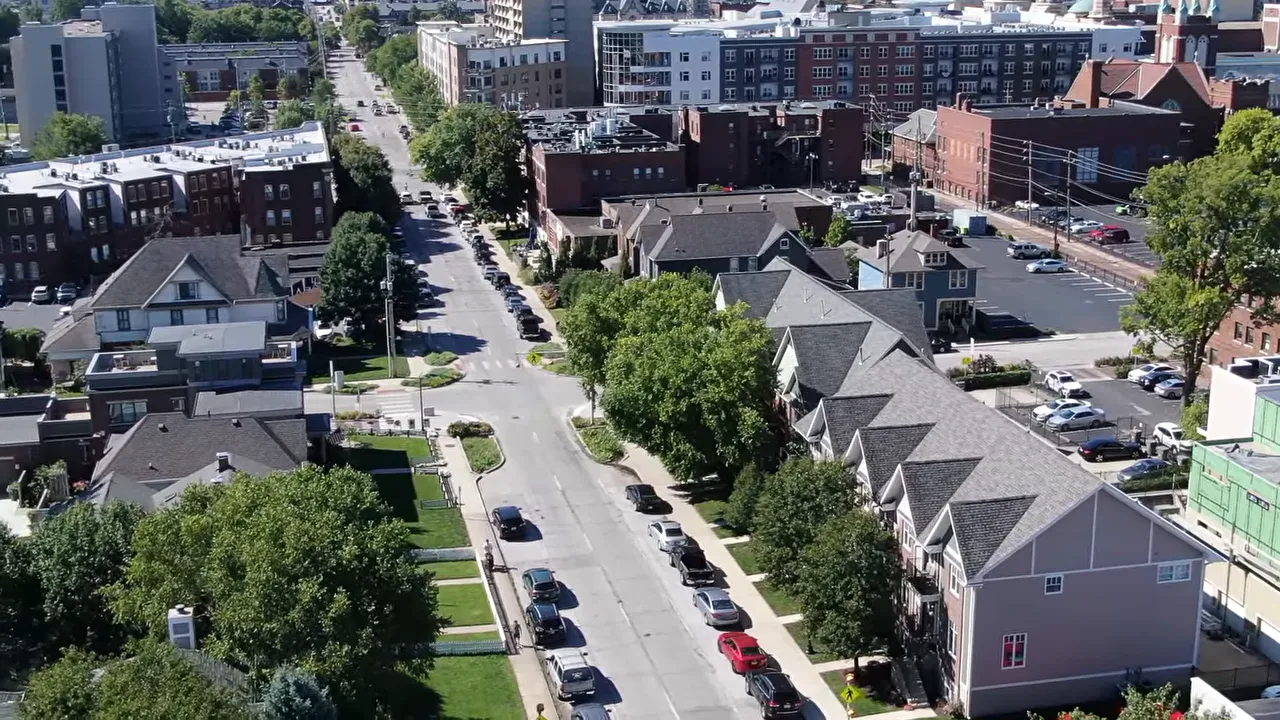 Aerial view of Indianapolis neighborhood streets with apartment and townhouse buildings