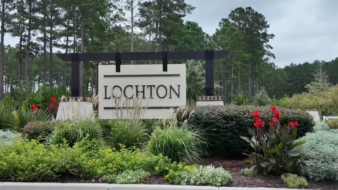 Lockton at Cane Bay community entrance sign with landscaped grounds