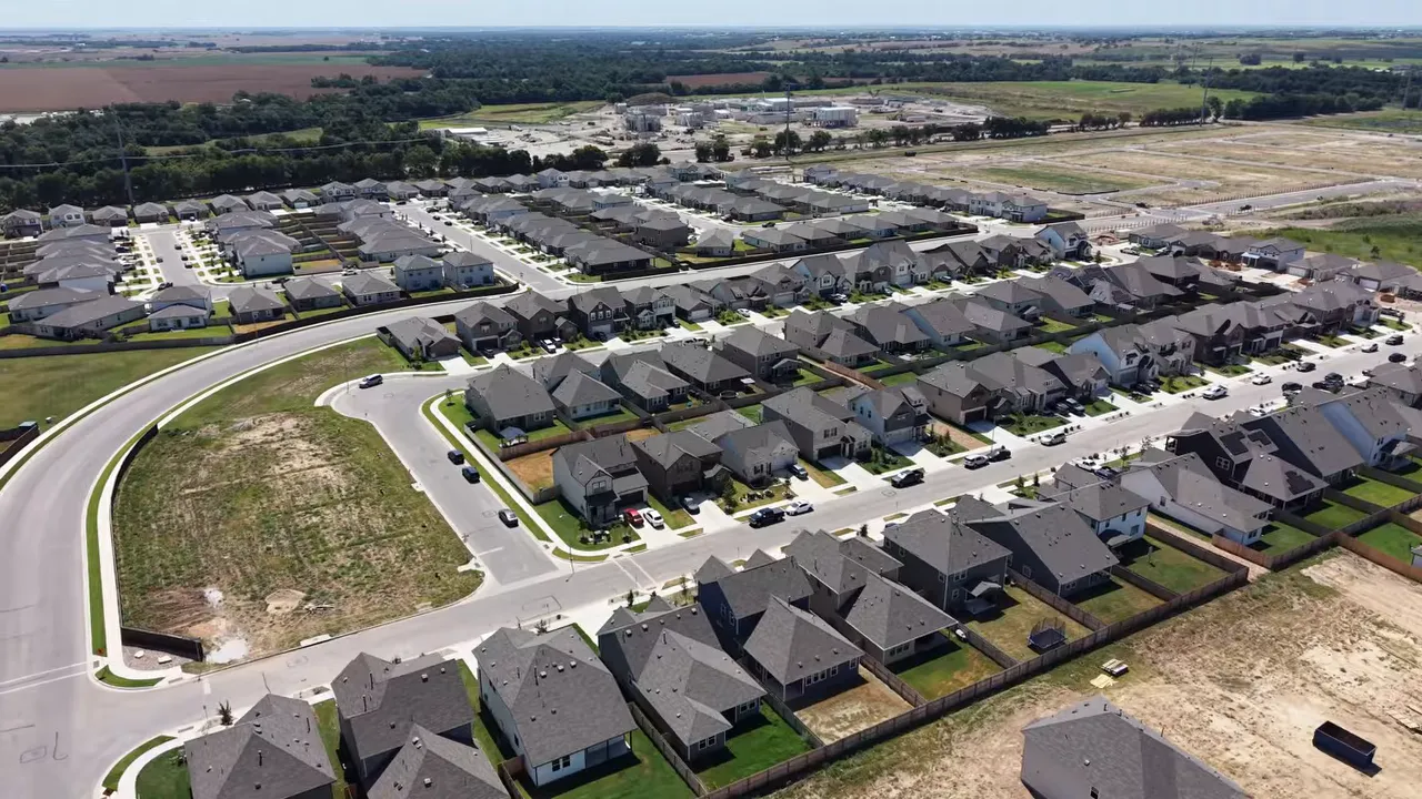 Aerial view of completed Rolling Glen homes and active construction areas