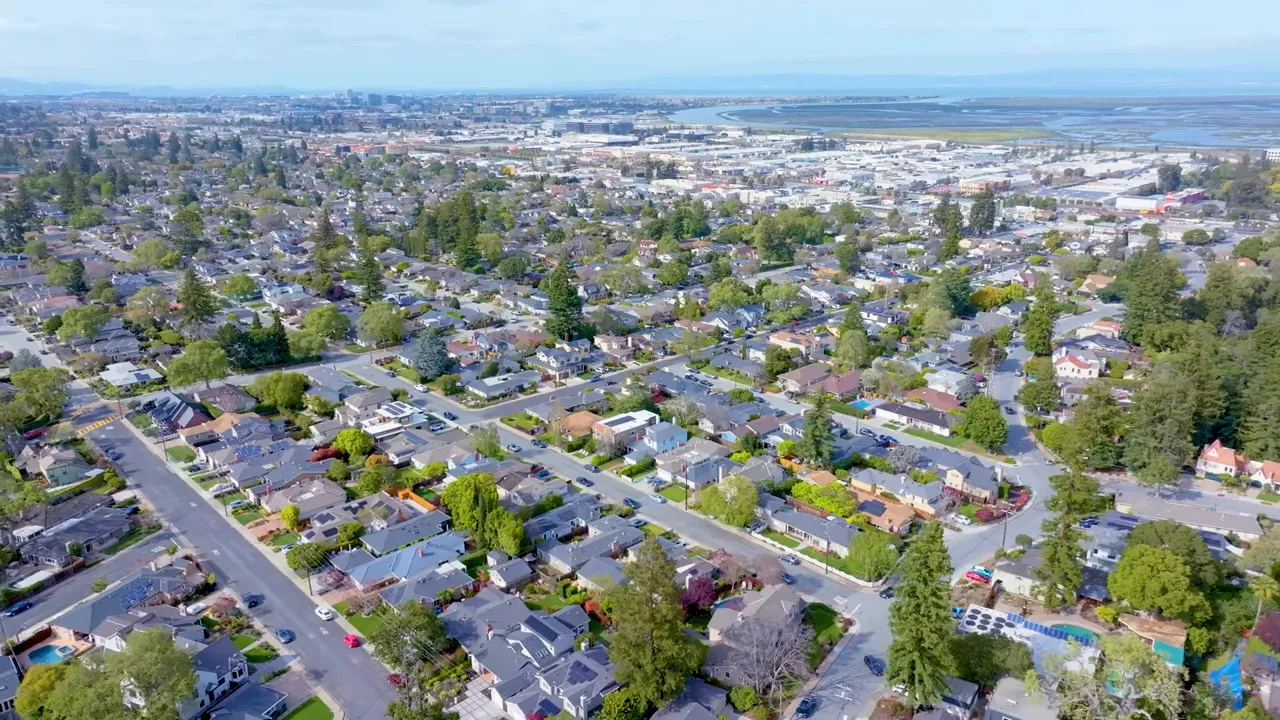 Typical San Carlos residential street with newer and older homes