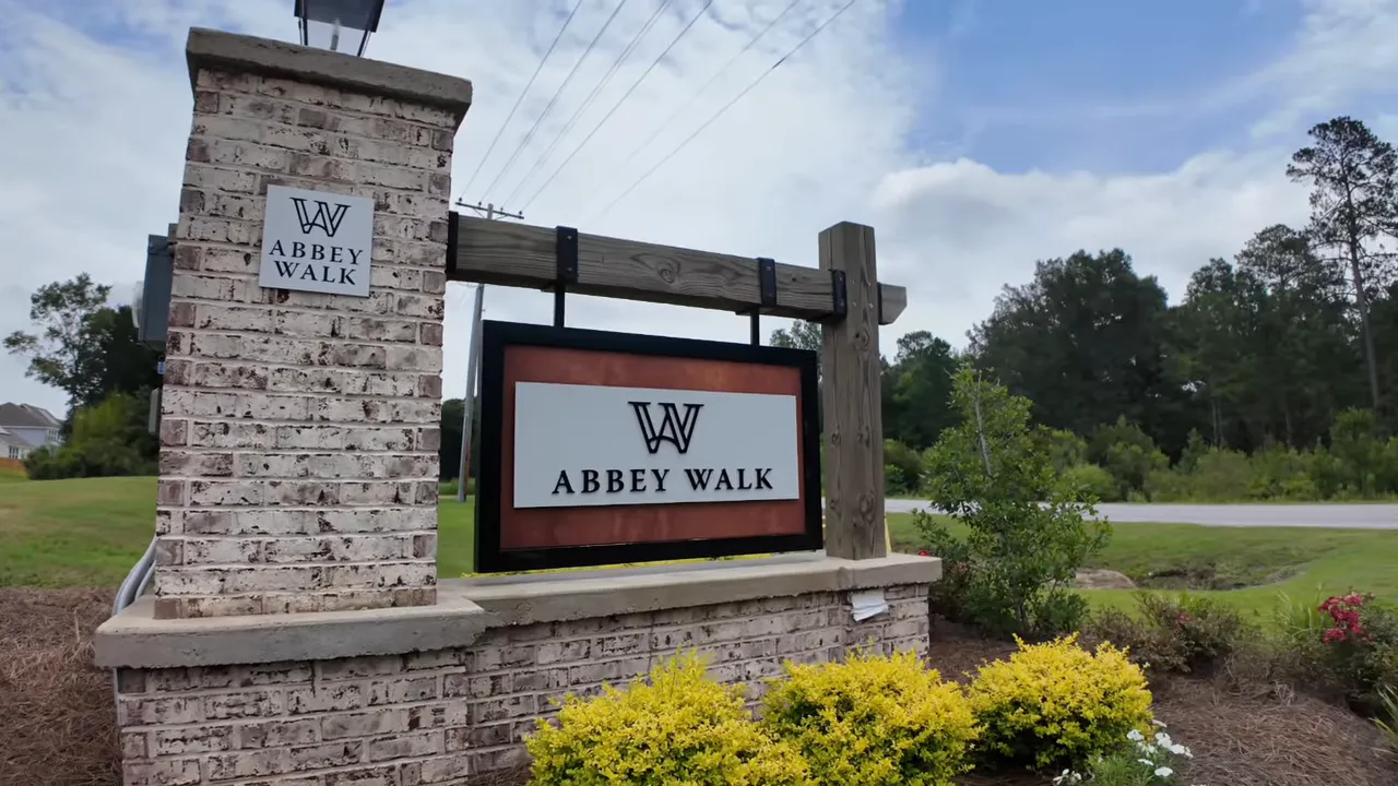 Abbey Walk stone entrance sign