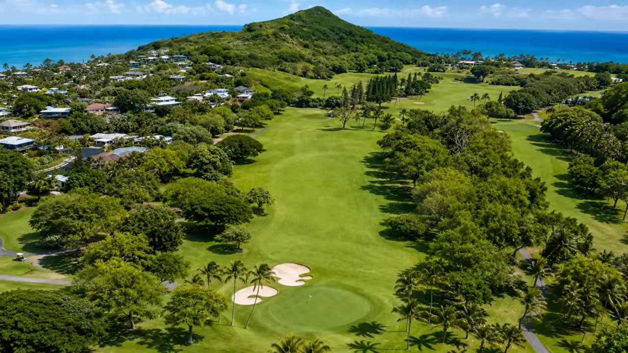 Fairway at Mid-Pacific Country Club with ocean and mountain views